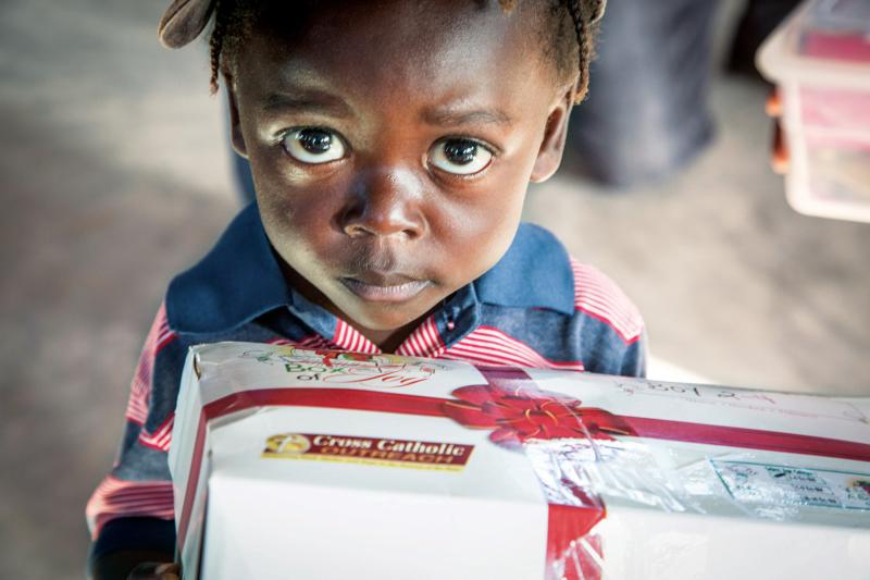 Happy child with meal